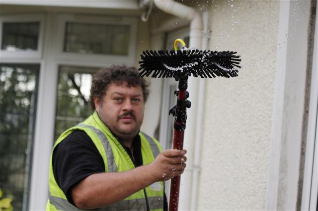 window cleaner window cleaning using water fed pole 